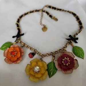 BETSEY JOHNSON PRIMARY FLOWER NECKLACE WITH LADY BUG LEAF AND BOWS